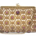 An Embroidered Silver Gilt and Ruby Purse